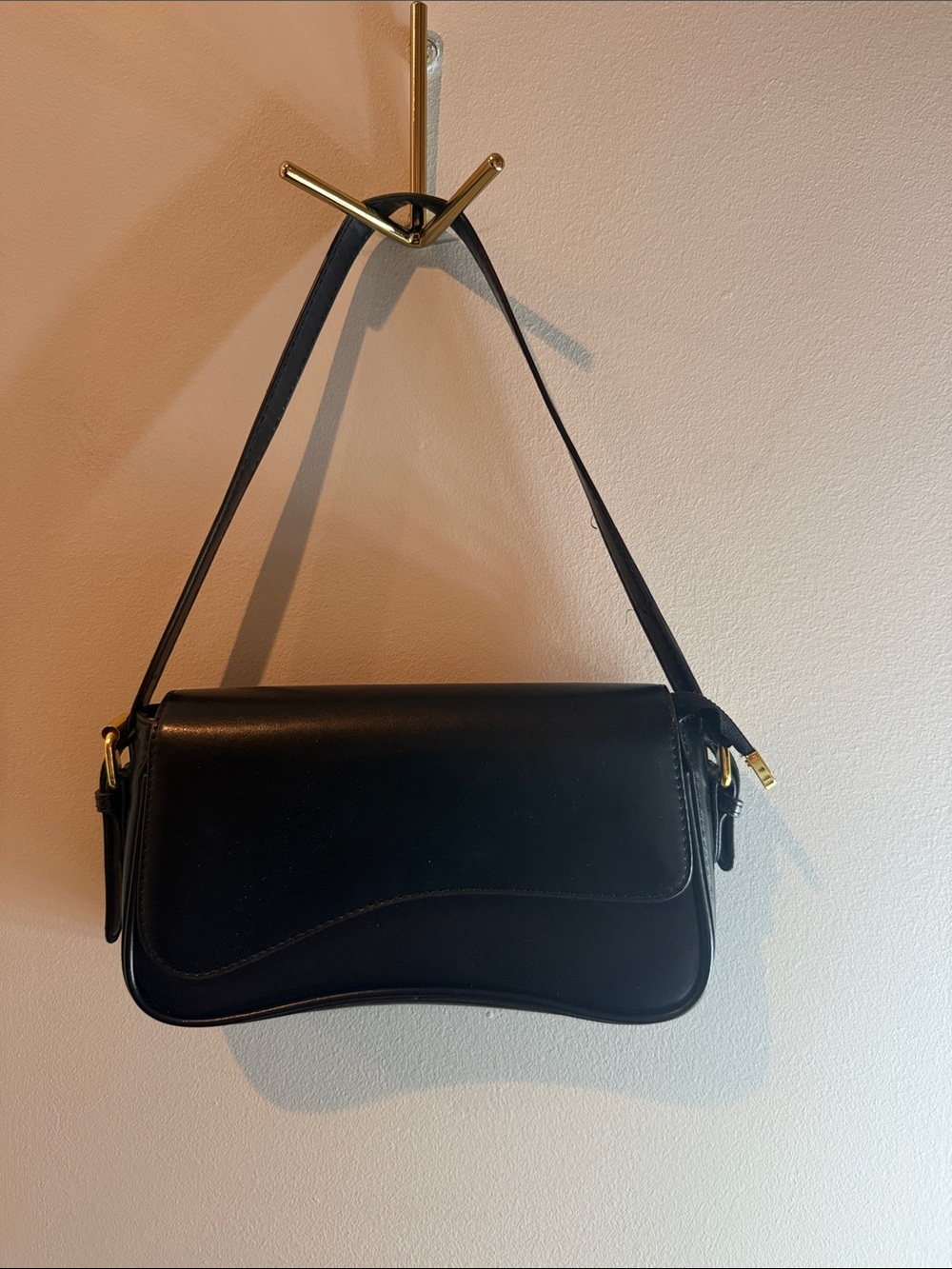 Amazon Black Leather Shoulder Bag with Gold Hardware
